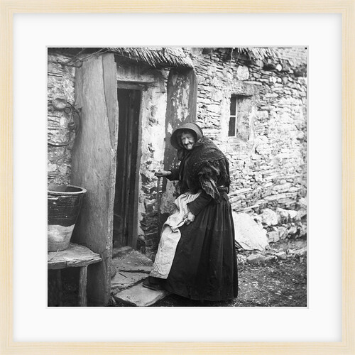 Woman entering Thatched Cottage, Sulby, Isle of Man by George Bellett Cowen